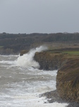 LZ00667 Waves crashing against cliffs at Llantwit Major beach.jpg